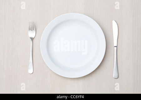 An empty plate on a table Stock Photo