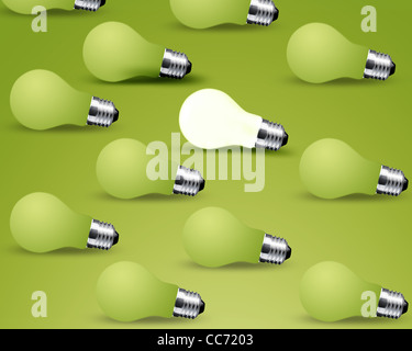 one glowing Light bulb from many turn off Light bulbs, idea on green background Stock Photo