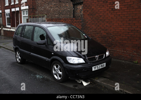 Broken car window on Vauxhall Zafira drivers side Stock Photo