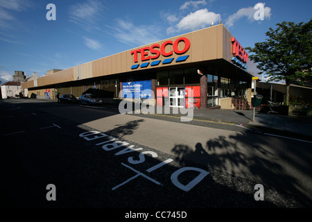Disabled parking spaces outside a Tesco supermarket Stock Photo