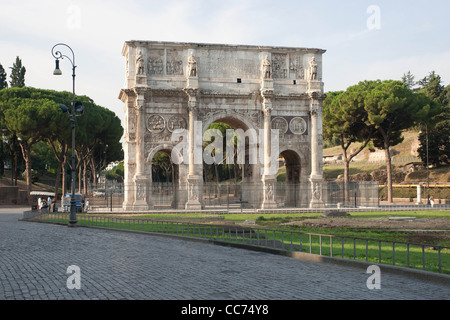 This huge triumphal arch (21 meters high), with three barrel-vaulted passageways, was erected to commemorate Constantine's victory over Maxentius at the Battle of Milvian Bridge in 312. It is just west of the Colosseum and dwarfs the nearby Arch of Titus. It incorporates recycled sculpture from earl Stock Photo