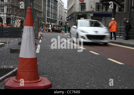 traffic passing through a contra flow in roadworks in London Stock Photo