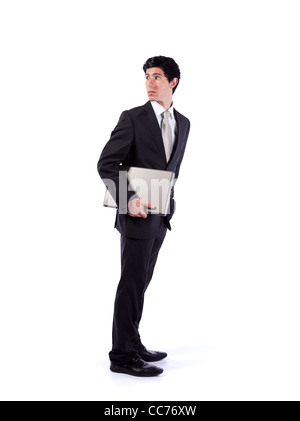 Businessman holding a laptop and looking back (isolated on white) Stock Photo