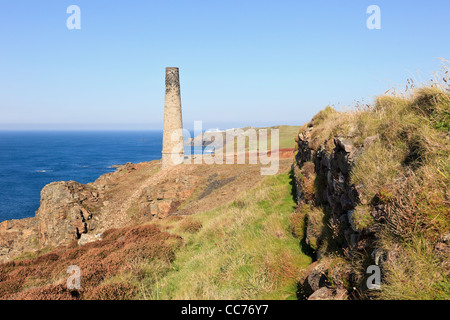 Pendeen, Cornwall, England, UK, Britain. Old tin mine chimney on the north Cornish coast Stock Photo