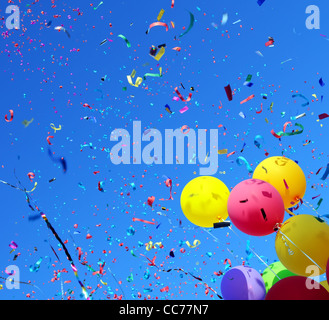 multicolored balloons and confetti in the city festival #2 Stock Photo