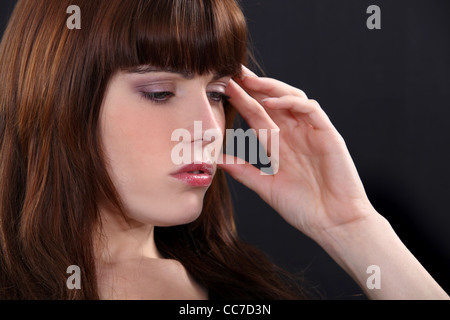 Woman suffering from headache Stock Photo