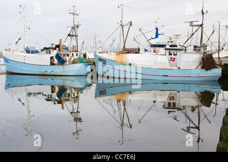 Fishing Boats, and their Reflections, in Harbour, Gilleleje, Sjaelland, Denmark Stock Photo