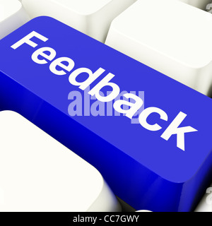 Feedback Computer Key In Blue Showing Opinion And Surveys Stock Photo