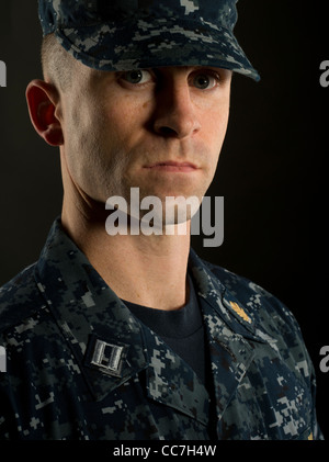 United States Navy Officer in Service Dress Blues Uniform with Stock ...