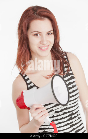 Young woman holding a megaphone Stock Photo