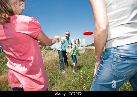 Family Playing Frisbee, Mannheim, Baden-Wurttemberg, Germany Stock Photo