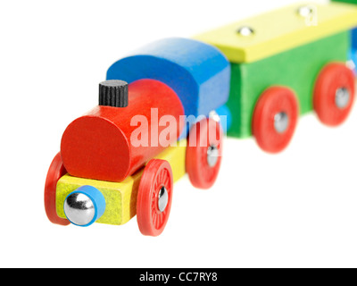 studio photography of a colorful wooden toy train in white back Stock Photo