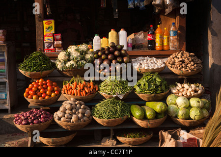 India, Arunachal Pradesh, Dirang bazaar, early morning, vegetable stall set out with fresh local produce Stock Photo