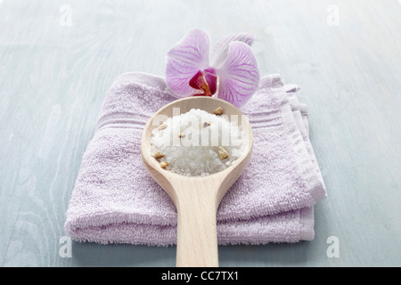Bath Salts and Orchid on Towel Stock Photo