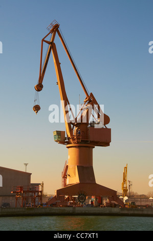 Dock crane loading bulk carrier with recycled scrap metal 