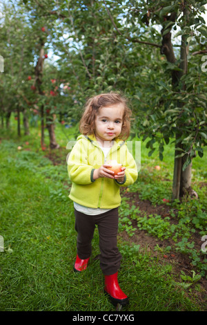 Girl at Apple Farm, Hood River County, Oregon, USA Stock Photo