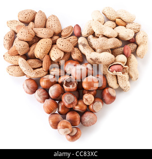 Nuts in the shape of heart isolated on a white background. Stock Photo