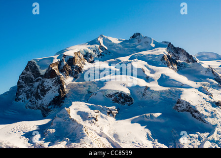 Monte Rosa mountain peak in winter. View from Gornergrat, Zermatt, Switzerland. Stock Photo