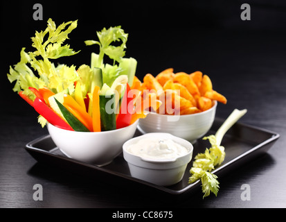 Raw vegetable and wedges with cream cheese dip Stock Photo