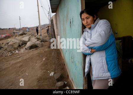 A woman in a squatter village in Lima, Peru, South America. Stock Photo