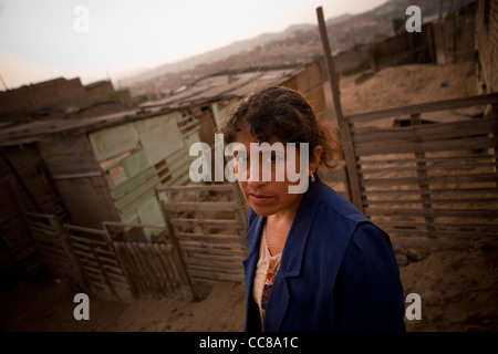A woman in a squatter village in Lima, Peru, South America. Stock Photo
