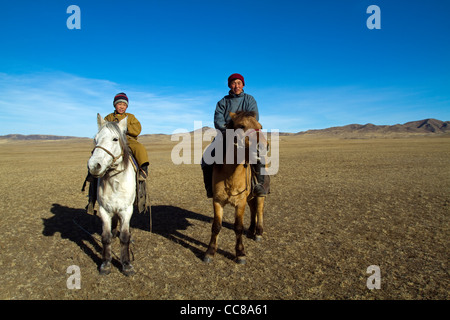 Mongolian herders in Gobi steppe Mongolia Stock Photo - Alamy