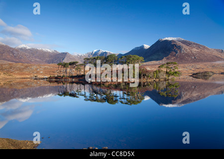 Winter reflection of the Twelve Bens in Derryclare Lough, Connemara, County Galway, Ireland. Stock Photo