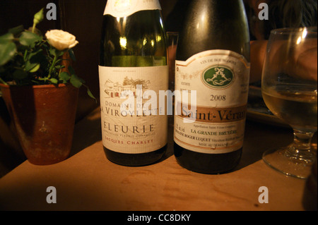 Bottles of wine at French restaurant La Poule au Pot, Ebury Street, Belgravia, Westminster, London, England Stock Photo