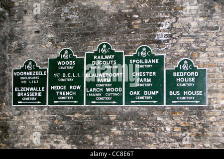 Imperial War Graves Commission direction signs to cemeteries in Ypres, Ieper, Belgium Stock Photo