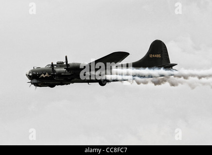 USAAC B-17 Flying Fortress four-engine bomber G-BEDF Sally B flying at Duxford in 2011 Stock Photo