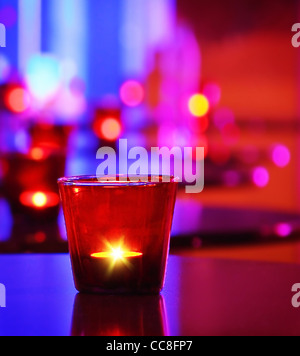 Romantic interior of a luxury restaurant with warm cozy candlelight Stock Photo