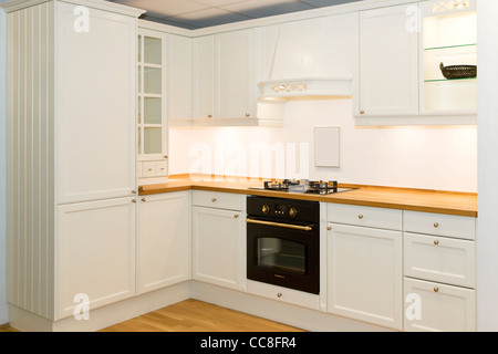 White modern kitchen in rustic romantic style Stock Photo