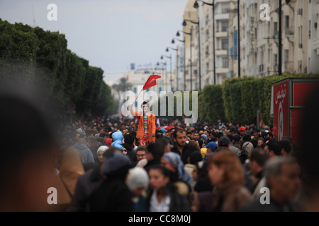 Clown Holding the Tunisian Flag in the 14 January 2012 Tunisian Revolution Celebration. Stock Photo