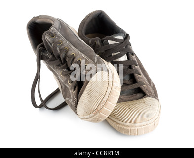 Old dirty sneakers isolated on white background Stock Photo