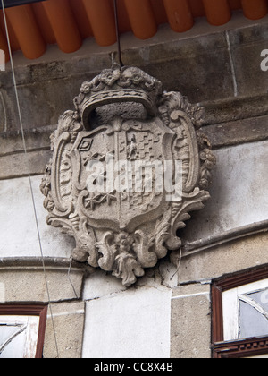 Stone crest on a house in Guimaraes, Portugal Stock Photo