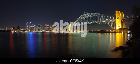 Sydney Harbour Bridge and city skyline from Kirribilli Stock Photo