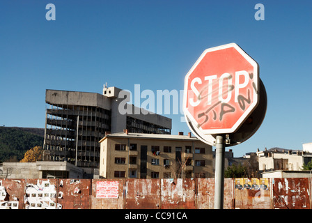 Stop sign and bombed buildings, Mostar, bosnia and herzegovina Stock Photo