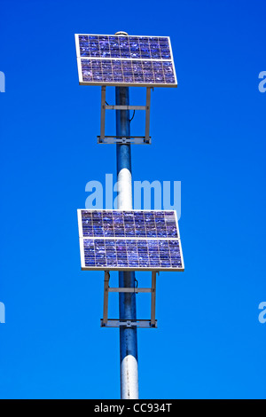 solar energy panels mounted on pole Stock Photo