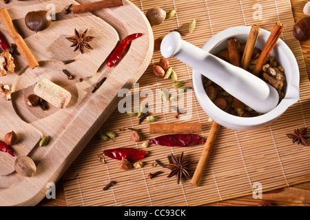 White mortar and different kinds of spices Stock Photo