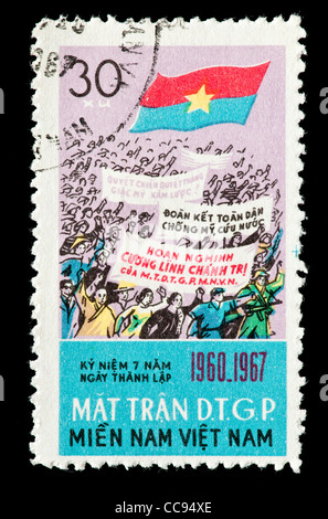 Postage stamp from North Vietnam depicting flags and workers Stock Photo