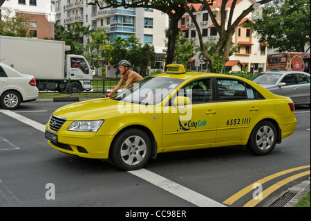 Yellow Taxi, Singapore. Stock Photo