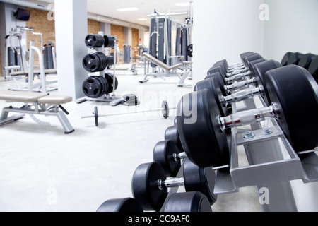 Fitness club weight training equipment gym modern interior Stock Photo