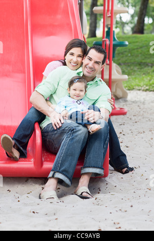 Family on Slide Stock Photo