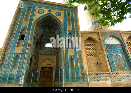 The Jameh (Friday) Mosque in Natanz, Iran is well-known for its unusually high entrance portal and its unusual calligraphy. Stock Photo