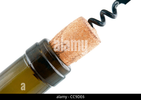 Dark brown bottle with a cork and corkscrew which is screwed into the cork Stock Photo