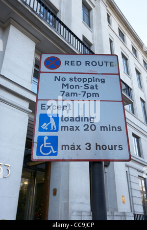 red route no stopping sign except loading and disabled 7am - 7pm London England UK United kingdom Stock Photo