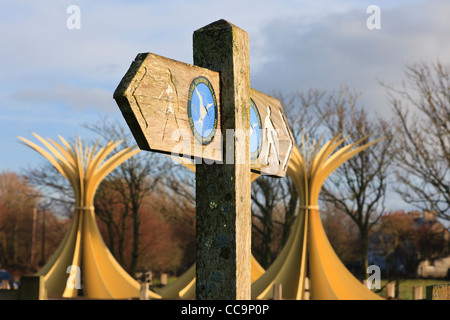 Isle of Anglesey Coastal Path signpost by the Marram Grass sculptures. Newborough Warren, Isle of Anglesey, North Wales, UK. Stock Photo