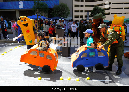 Transport police organise games in street to teach children to respect traffic signs and road laws for Pedestrian Day, La Paz, Bolivia Stock Photo