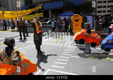 Transport police organise games in street to teach children to respect traffic controls for Pedestrian Day, La Paz, Bolivia Stock Photo