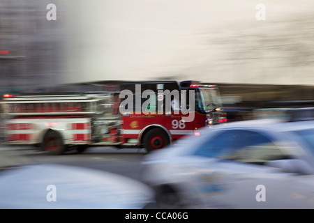 Chicago Fire Department fire engine responding to call, blurred action. Stock Photo